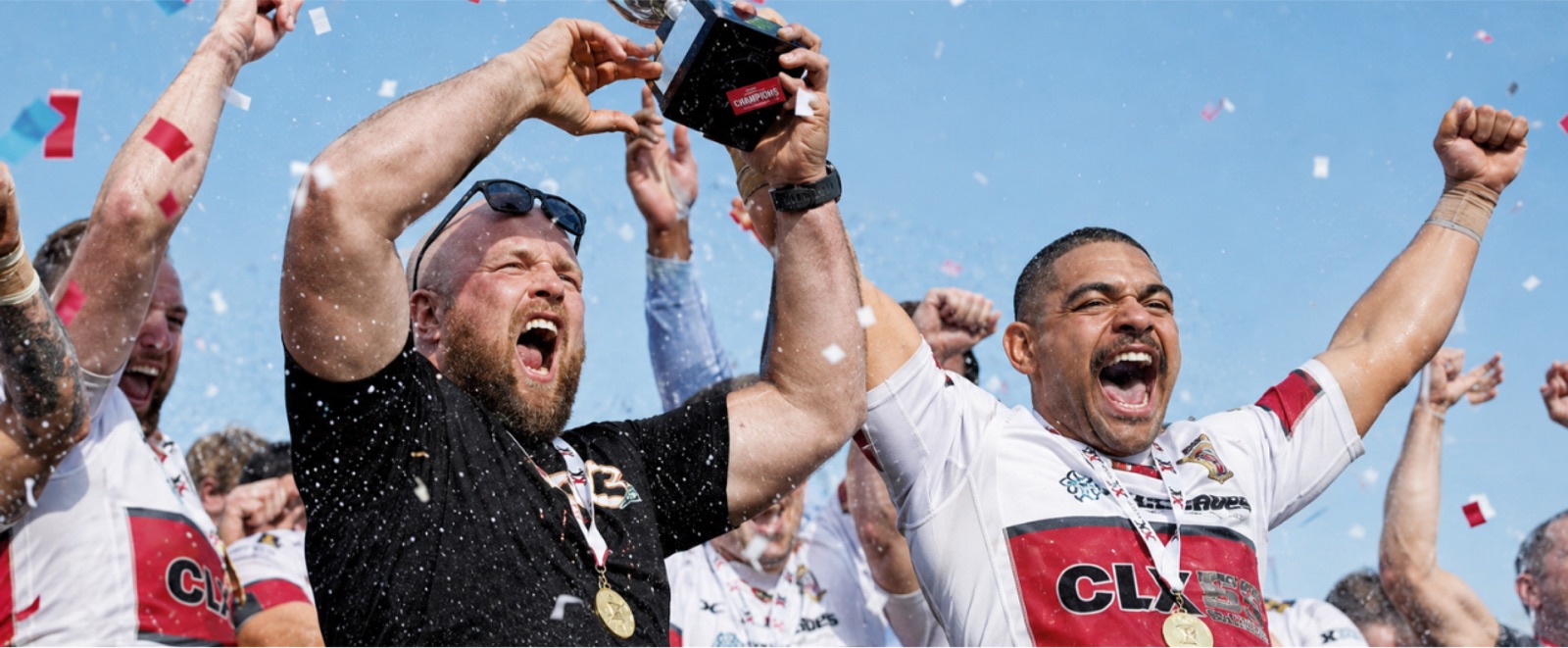 Camborne RFC players celebrating with the Cornwall Cup